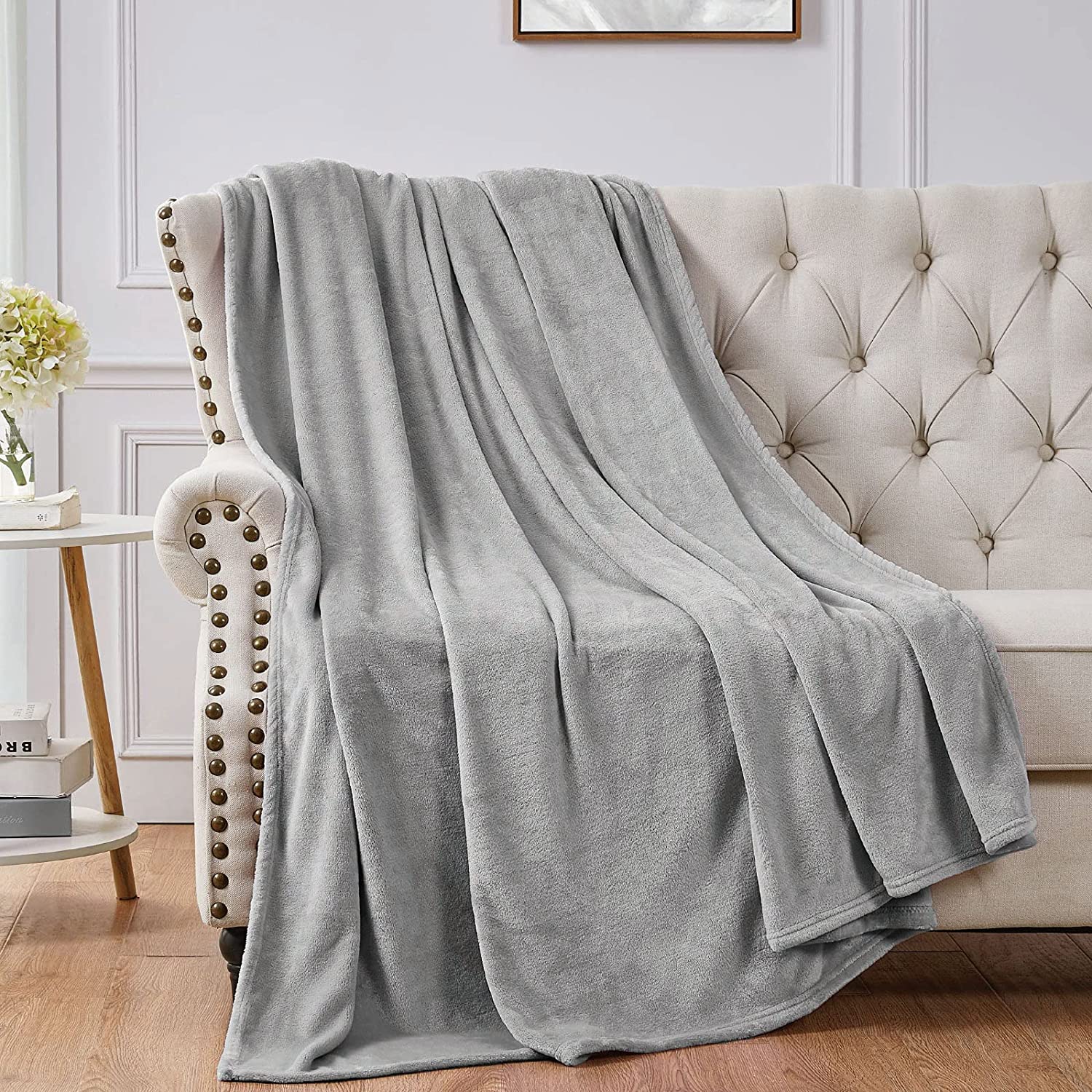 Fleece blanket, Fleece throw blanket, fluffy blanket, warm blanket, soft blanket "Soft light grey fleece sofa throw blanket. Cozy and stylish. Perfect for snuggling. High-quality material. Available now at our e-commerce store." best soft fleece sofa throw blankets in Ireland, soft, cozy, snuggy, warm, romantic